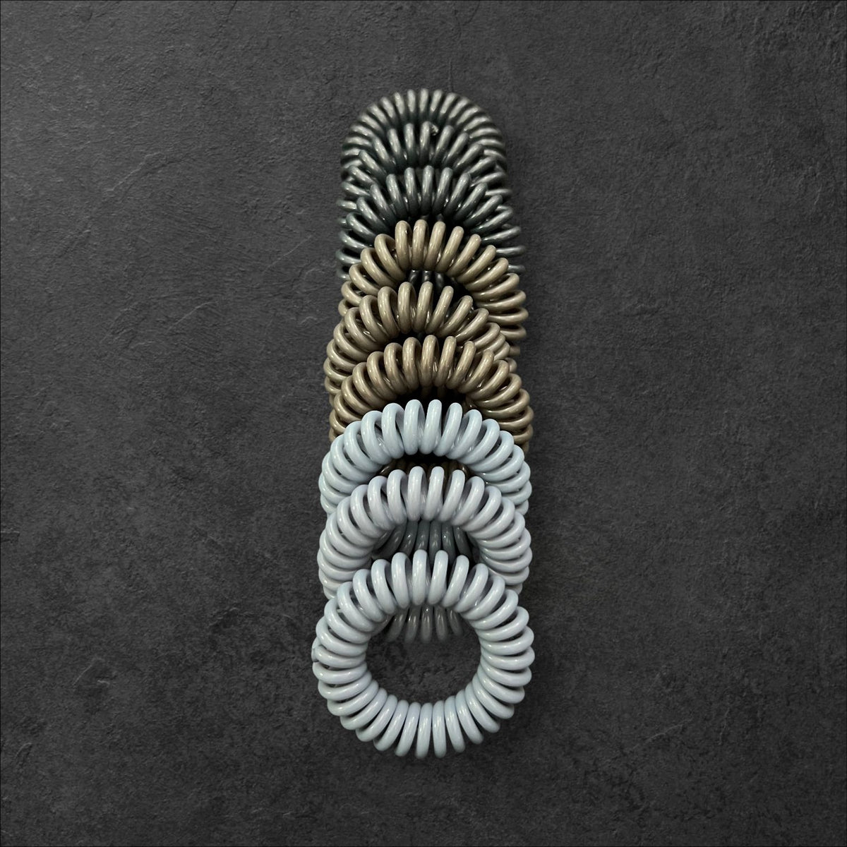 Spiral Hair Tie Set – 9pcs Anti-Tangle Hair Coils (Multiple Colors) at Wholesale Prices
